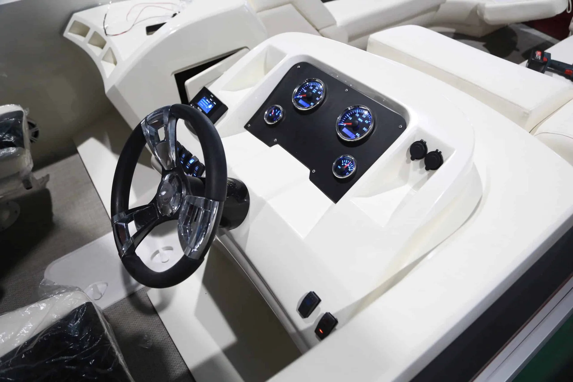 Pontoon helm with steering wheel, gauges and switch panel